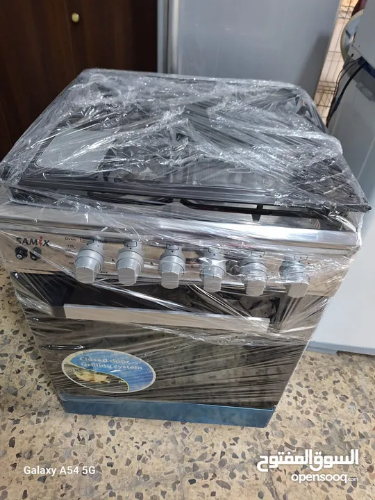 غاز 4عيون مع فرن فوق وتحت ستانليس مقاس 60س مع كهرباء بحالة الجديد