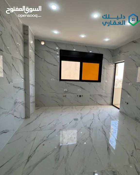 شقة ارضية مع ترس  جاهزة للسكن  جبل المغير -خلف فندق الجوابرة بتشطيبات جدا فاخرة