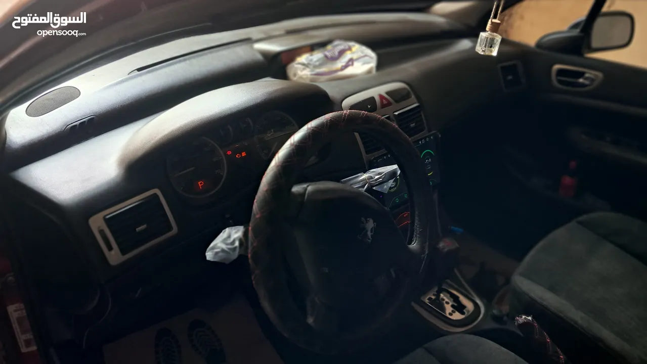 بيجو 307 2005  مطور2000 100% مكنيكيات الف الف دهان جديد مزجان حامي بارد منفوضة من النمرة ل النمرة