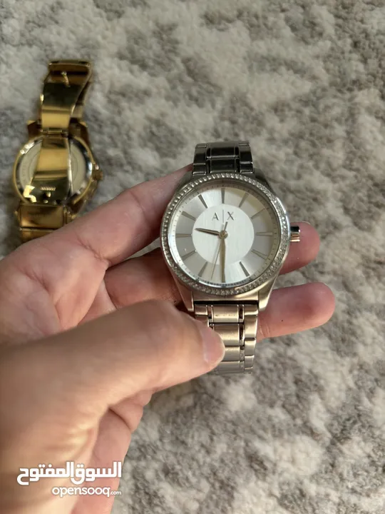 Michael Kors and Armani Exchange Women’s watches. Used but in good condition.