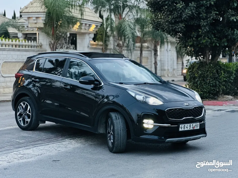 كيااا سبورتاج مطور 2000 بنزين 2*4 الجيب بالكراتين فل اضافات ملغم امكانية البيع نص بالنص الله يبارك