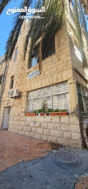 عمارة للبيع في الهاشمي شمالي موقع مميز