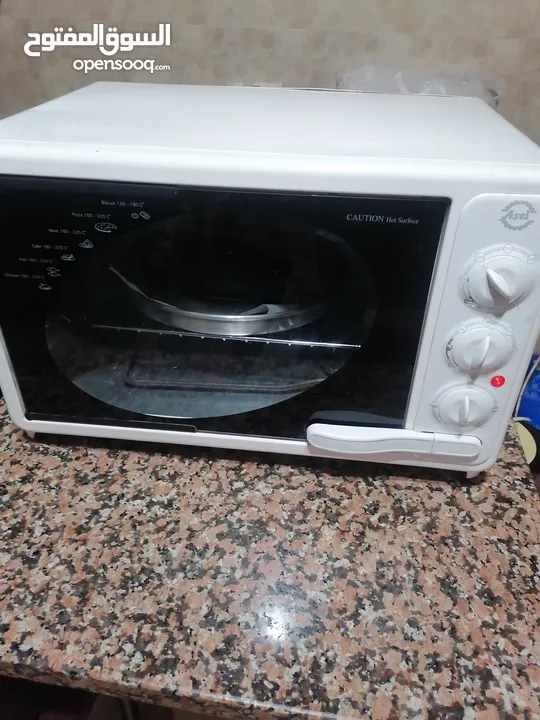 فرن كهرباء صناعة تركية جديد شغال من فوق وتحت معة صنية وشبك حجم كبير