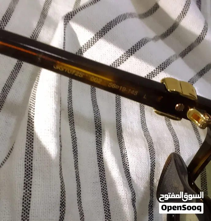 نظارات شمسية Gucci havana اصلية 100% شبه جديدة مع الرقم التسلسلي موجود فيها