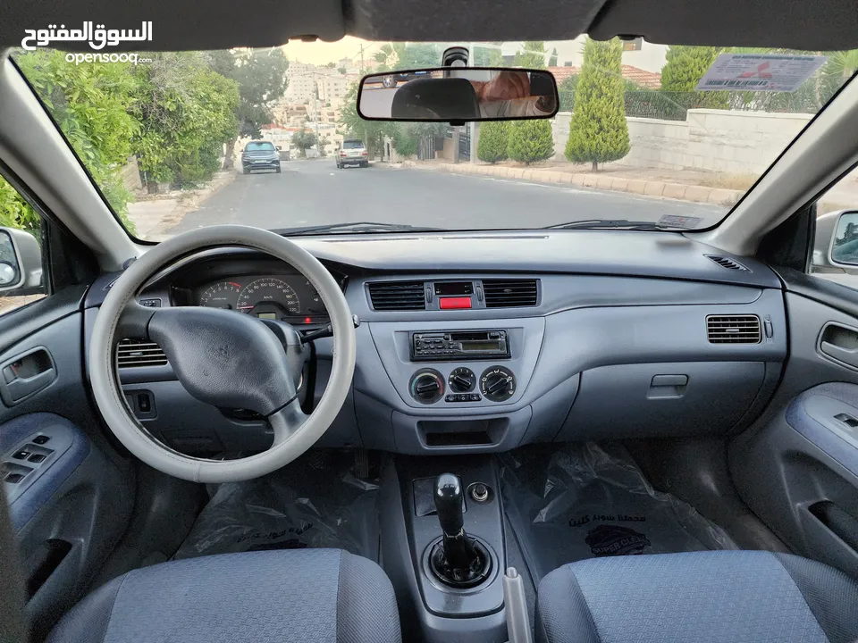 مستوبيشي لانسر 2003 محرك 1300جير عادي قتصادية جدا كاسير 4نجوم فحص كامل بسعر 4700