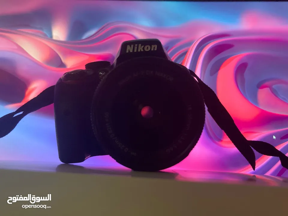 نيكون 3300d حال الوكاله  شتر قليل  عدسه 18/55 ستراب  وصلات  ترايبود  شاحن  بطاريه