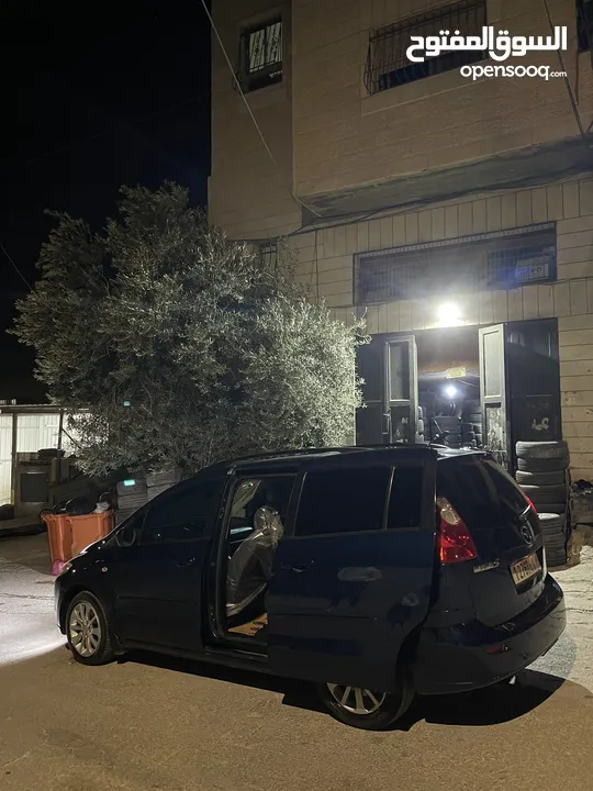 مازدا 5 جير عادي 6+1 متور 2000 بنزين رخصه و تامين جديد  عداد قليل فحص نخبب سعرر كااششش