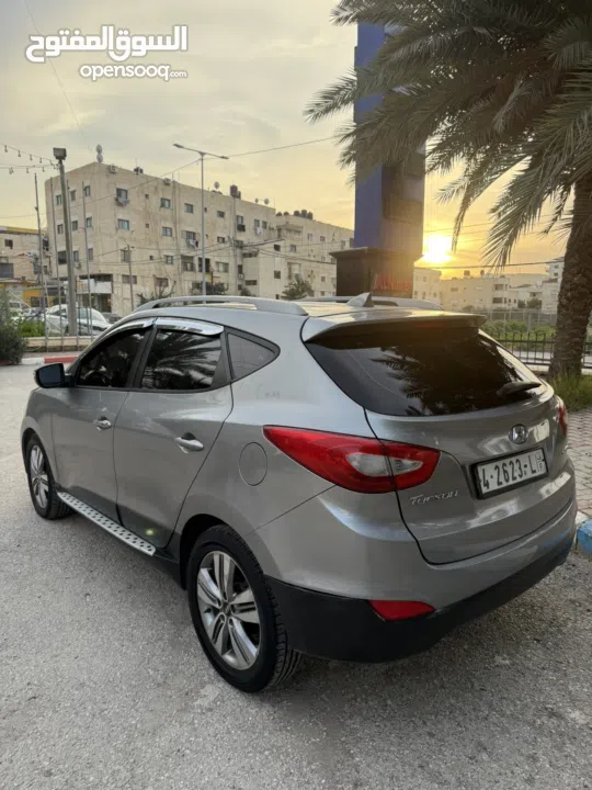 فقط 63 الف كاش جيب توسان2014 فل الفل دون فتحة فحص دهان شركة ترخيص تامين شامل جيب لعبة  بصمة شاشة