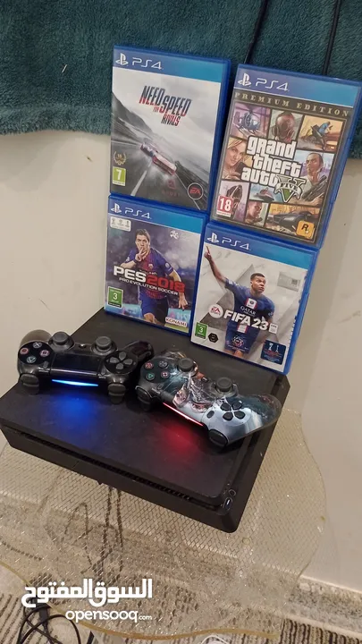 PlayStation 4 slim 1tb with 2 control and TV inch32 WhatsApp number +966 53 965 1956
