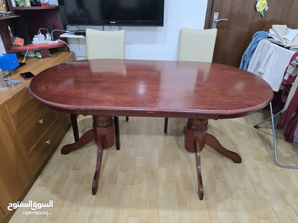 Sofa leather 2 seater in good conditions 25 kd table wooden 10 kd