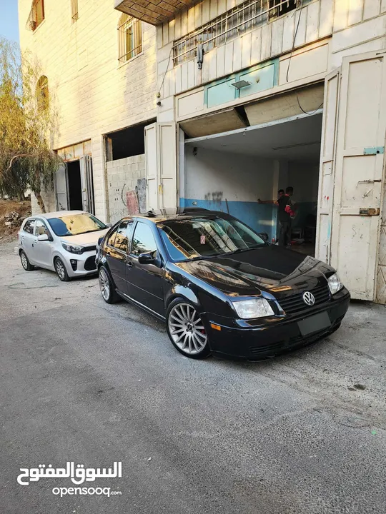 بورا 2002 بنزين متور 2000  قير عادي