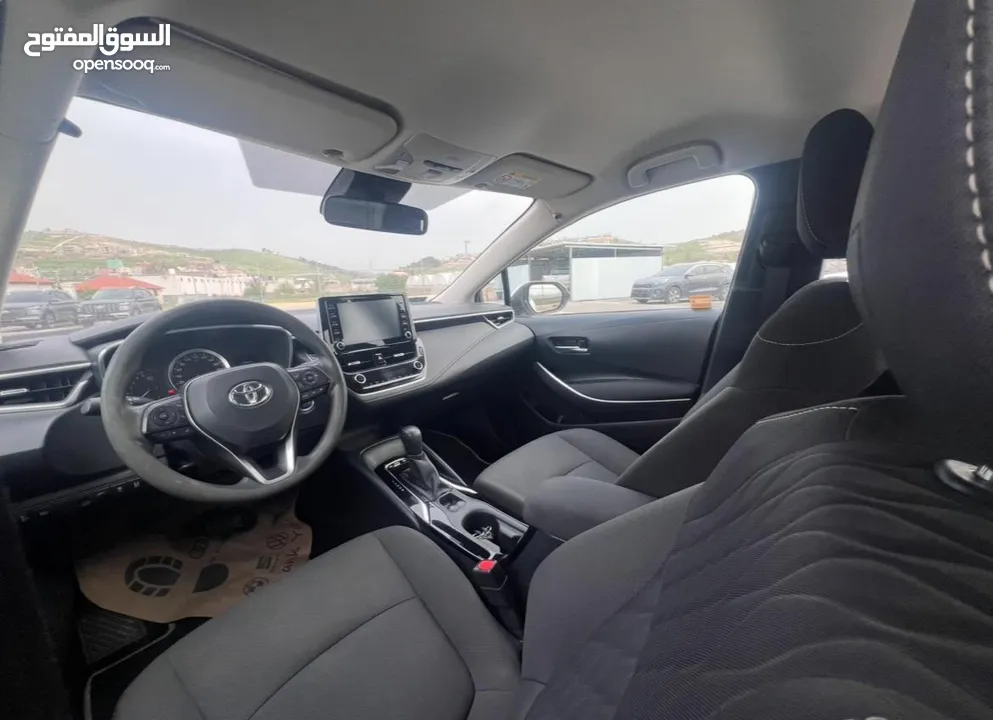 تيوتا كورولا هايبرد ترخيص 2022 فل بدون فتحة مميزة  ماتور 1800cc ( بنزين + كهرباء) 170Hp
