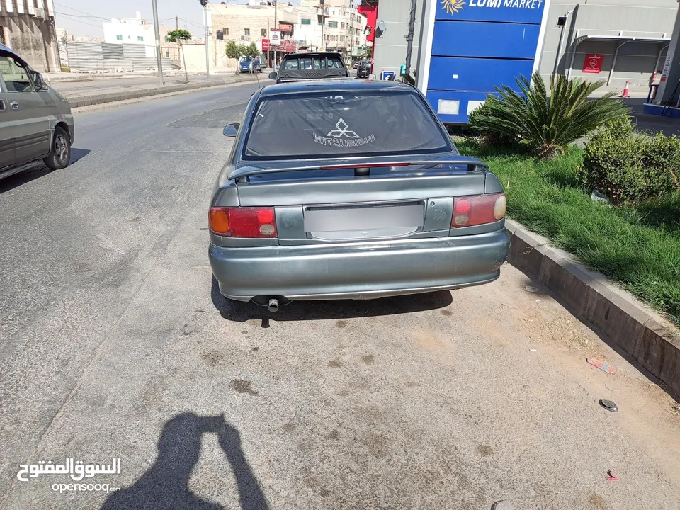 ميتسوبيشي لانسر موديل 93للبيع  مرخصة لغاية شهر 2/2026
