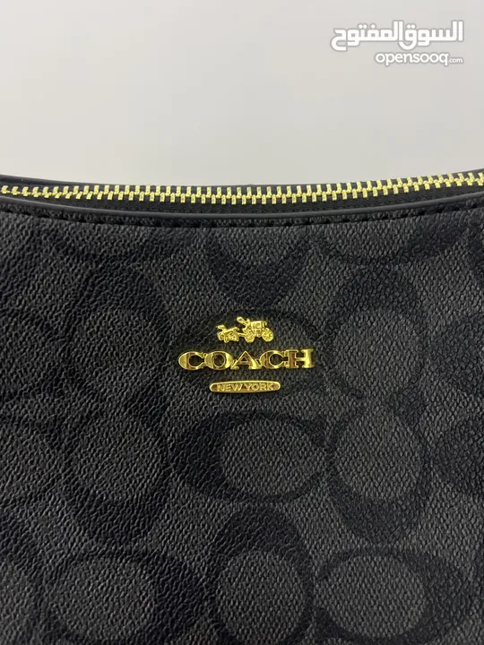 شنتة coach first copy  جلد باللون الأسود  للبيع