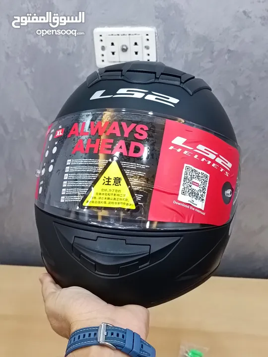 خوذت LS2   حجم XL  الون كاتم  جديده مع مستلزمات 3 اقنعه للوجه مع ستاند للكمره وجوال. وعلاقه للخوذه