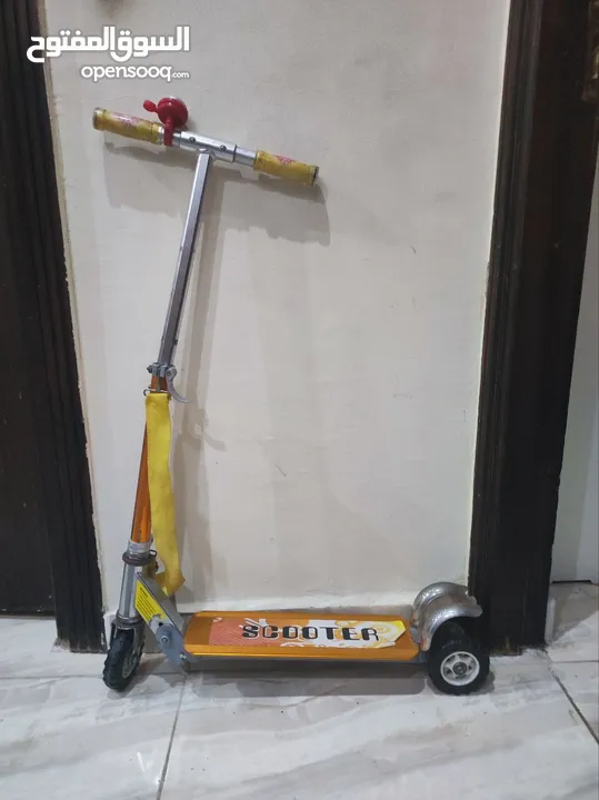 العاب اطفال شبه جديده - منزل - قطار - سكوتر - ماكينة تريكو