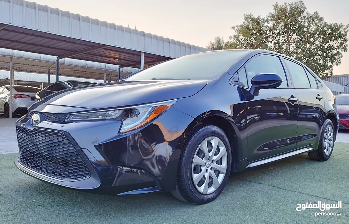 TOYOTA CAROLLA LE 2020 IN BLACK COLOR WITH MID OPTION ( NR 2) AND LOW MILAGE - VERY CLEAN AND MINOR