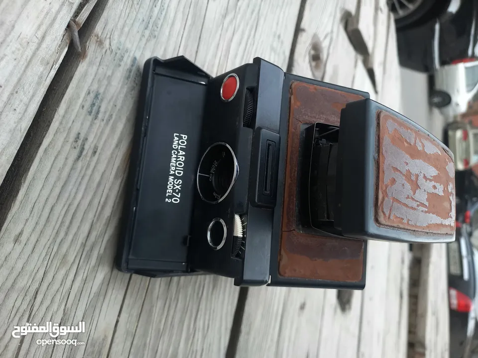 polarid sx70 & OLYMPUS & KODAK DISC
