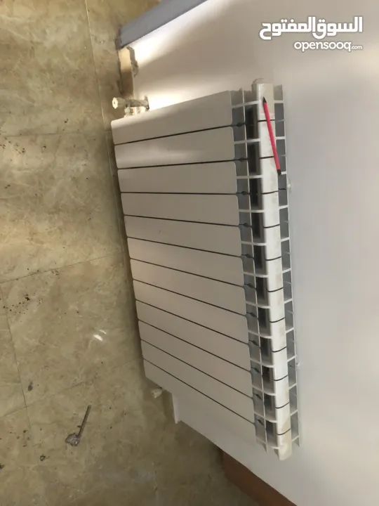 ماطور تدفئة مركزية مع خزان سولار مع الراديترات (المشعاعات)