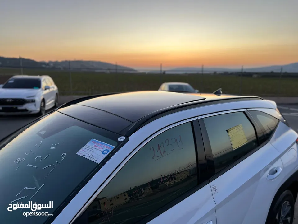 هونداي توسان 2023/ فل الفل فتحة سقف بانوراما  2x4 ///240Hp بنزين + كهرباء  ( Haybrid) 1600cc