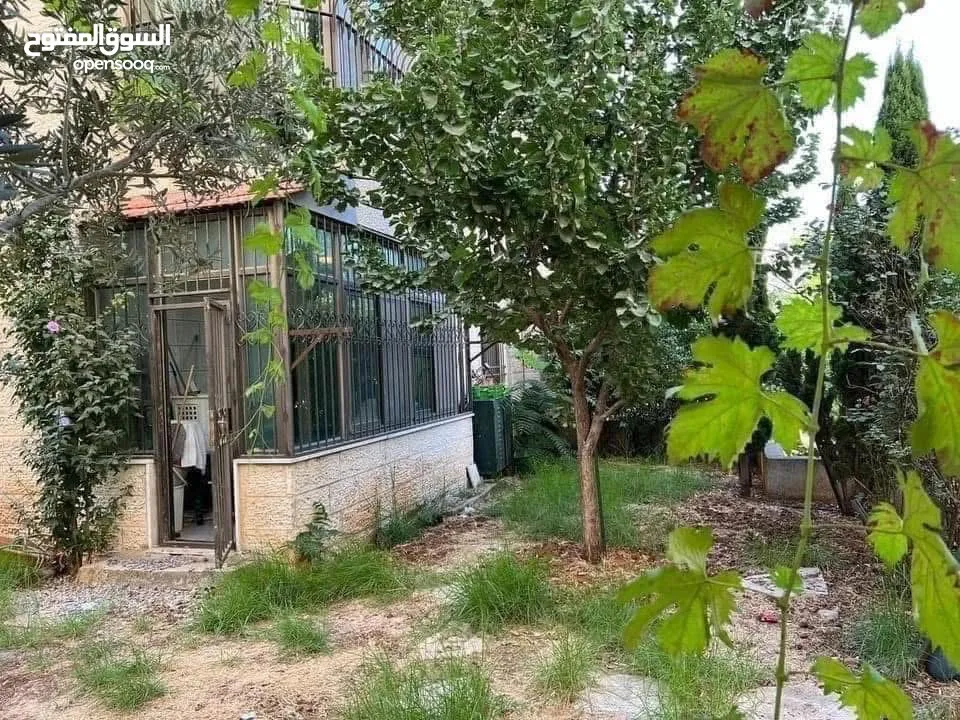 شقه للبيع مع حديقه خلف رام الله مول