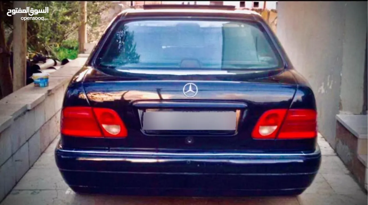 مرسيدس W210
