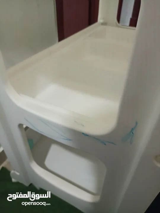 Juniors baby changing table with built-in tub