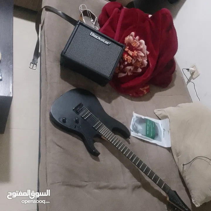 Ibanez electric guitar with amplifier