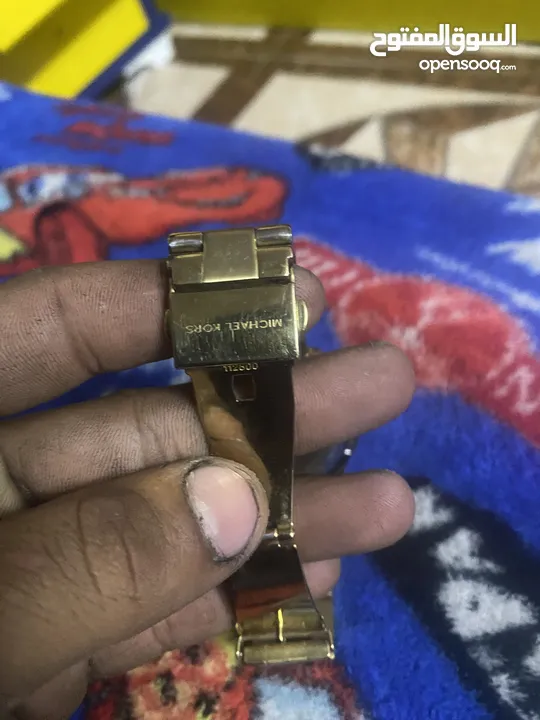 ‏ساعة مايكل كورس