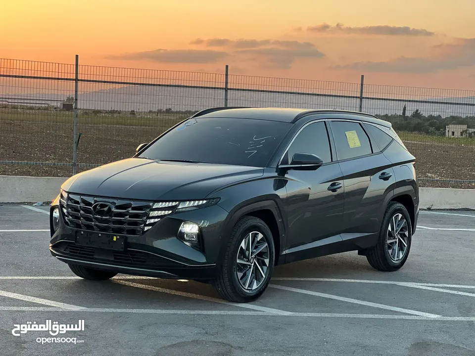 هونداي توسان/2022 فل الفل بدون فتحة سقف  2x4 ///240Hp بنزين + كهرباء  ( Haybrid) 1600cc