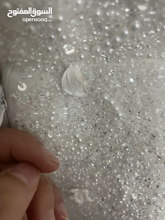 بدلة زفاف ابيض ثقيله ومن محل معروف جدا بنص السعر