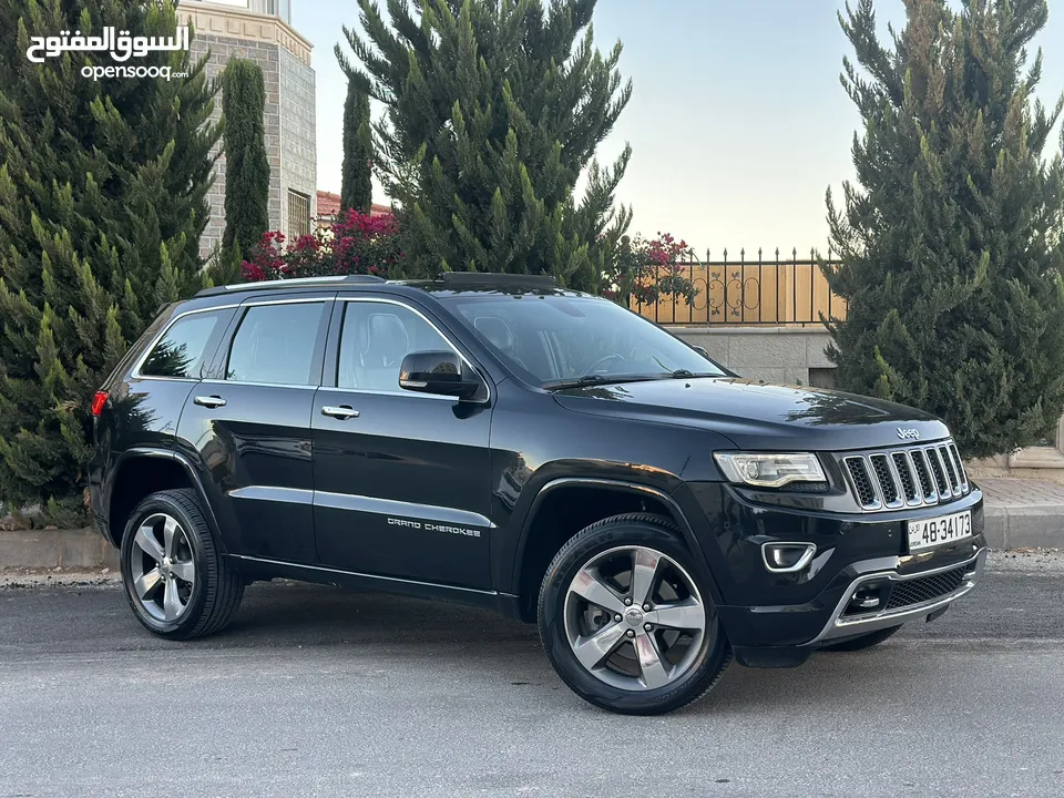 Jeep grand Cherokee 2014(Over-Land) 4*4 فحص كامل اعلى صنف مع بانوراما لون اسود مميز