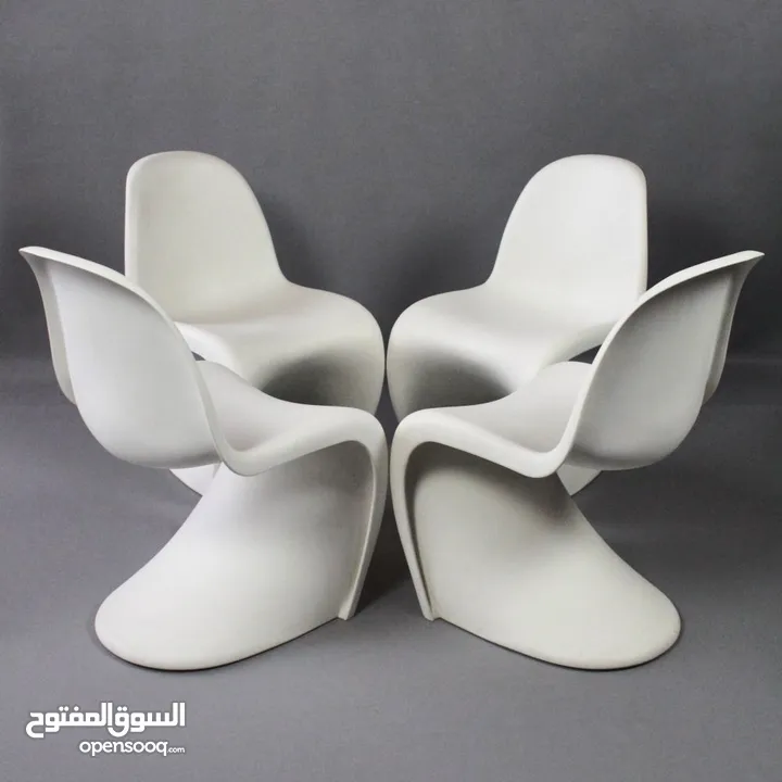 4 White Authentic Verner Panton (by Vitra) Chairs.