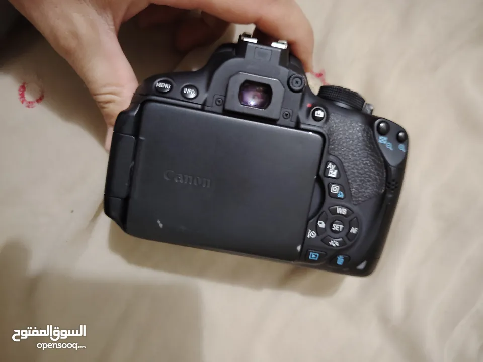 كاميرا كانون مع عدسه Canon camera with lense