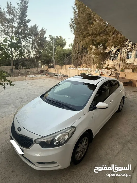 كياK3 سيراتو فتحة سقف  2014 بنزين ماتور 1600 نخب