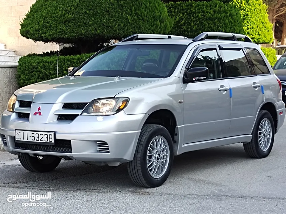 ميتسوبيشي آوتلاندر اوتوماتيك 2003 توب نظافة بسعرررر مميززز محرك 2400cc