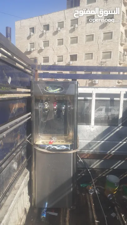 كولر ماء مع فلتر ستانلس ستيل  شغال بحال الجديد
