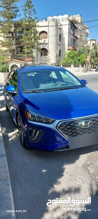 هونداي أيونيك 2021 لون ازرق ميتالك فل كامل اعلى صنف Limited مع فتحة فحص كامل جمرك جديد