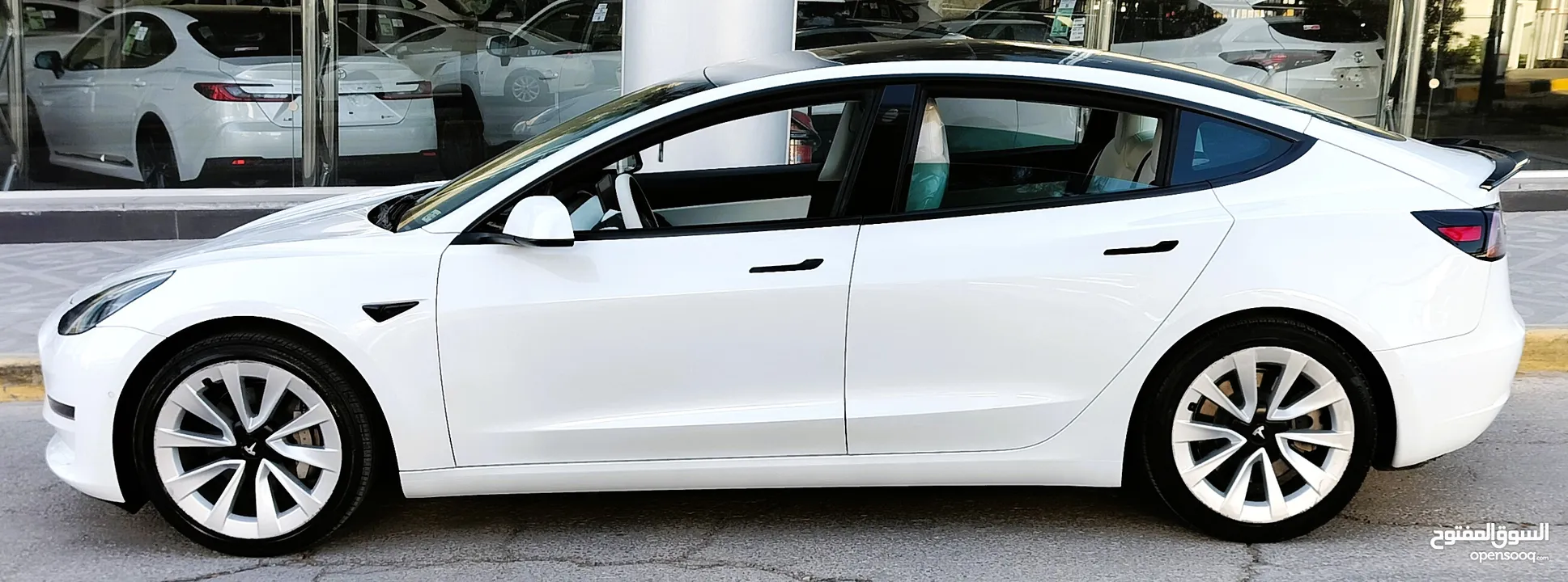تيسلا 2021 model 3 فحص كامل 4 جـيـد فرش ابيض جنط 19بحالة الوكالة لون مميز للبيع بسعر لقطة ومحروووق