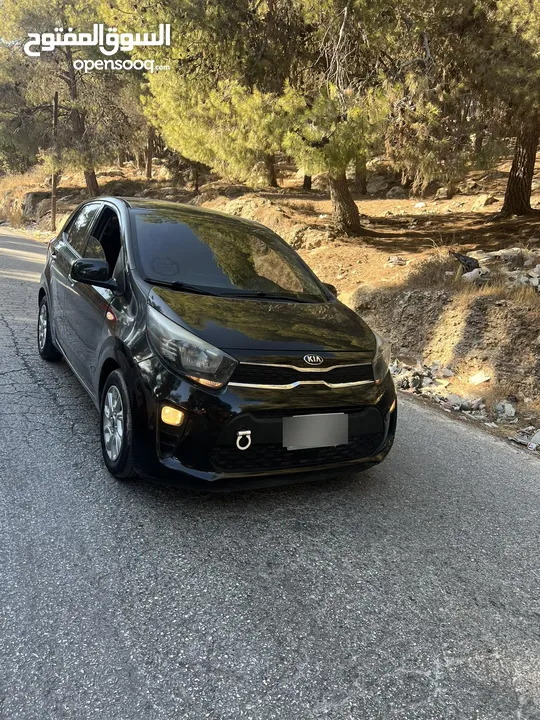 سيارة للبيع كيا مورننغ باللون الاسود المميز ،،،، سعر مغري ع الكاش