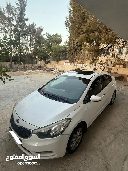 كيا k3 سيراتو 2014 مع فتحة سقف نخب بنزين