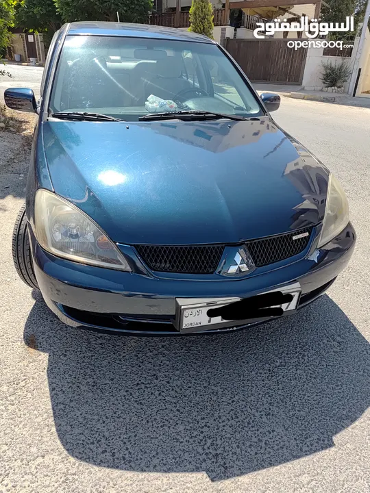 متسوبيشي لانسر GLX 2007 1600 cc وارد الخليج الكويت جميع الإضافات بإستثناء الفتحه وجنط إضافي.
