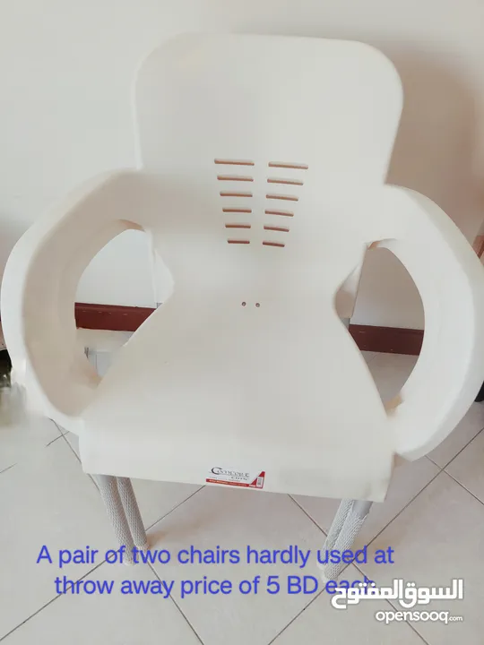 Two white chairs for sale 5 BD each (Negotiable)