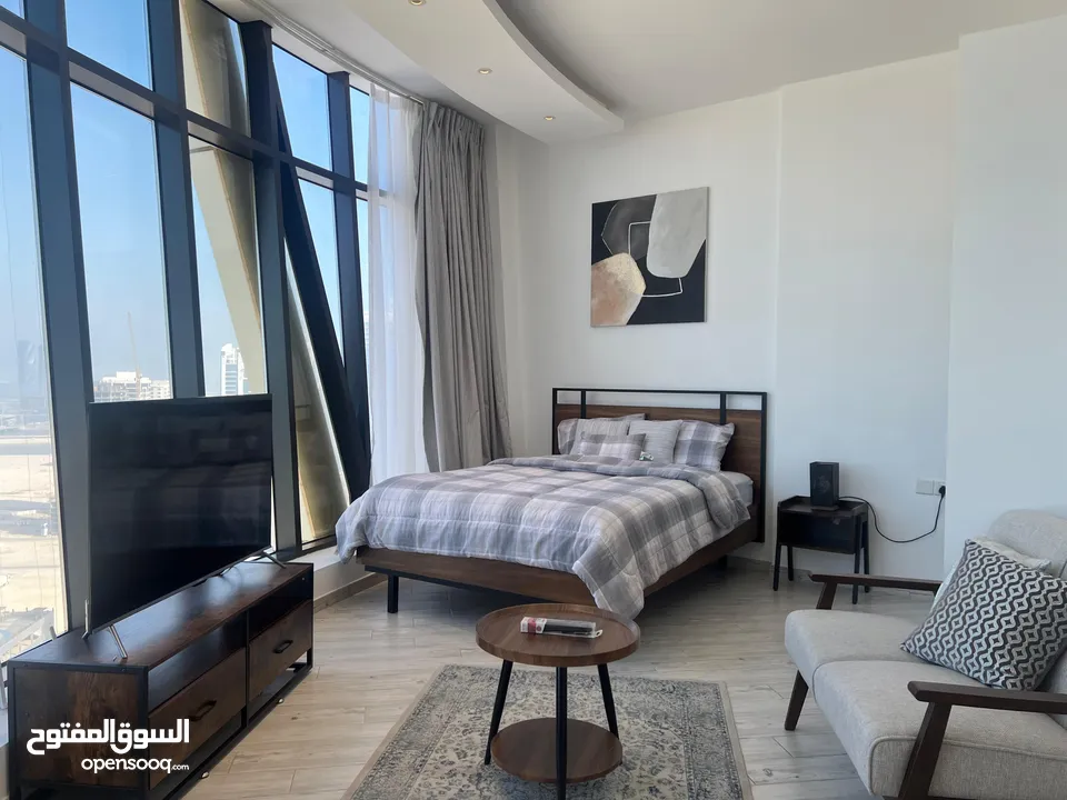 Amazing Sea View Studio fully furnished with amaizing bed and wardrobes in seef area