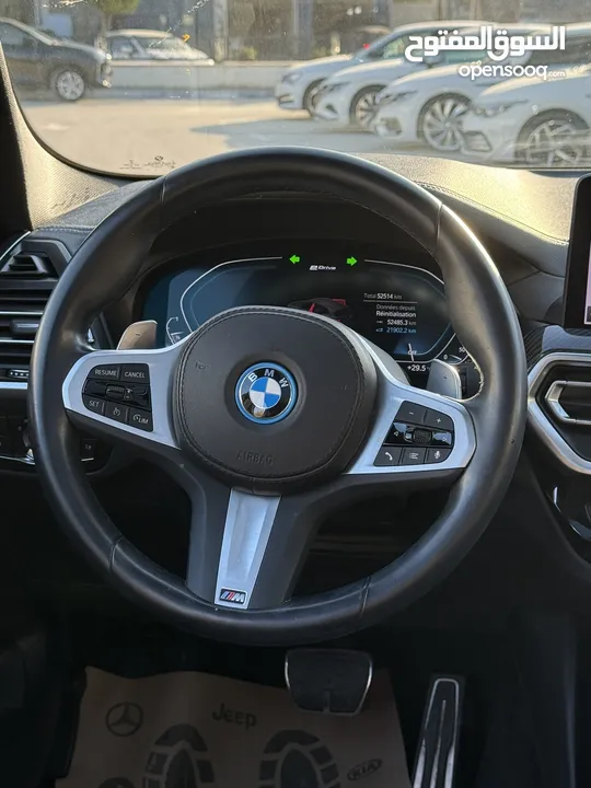 BMW x3 30e ترخيص 2022 ترخيص  محرك 2000 هايبرد plug in/يقطع على الشحنه 30 كيلو متر  293 حصان