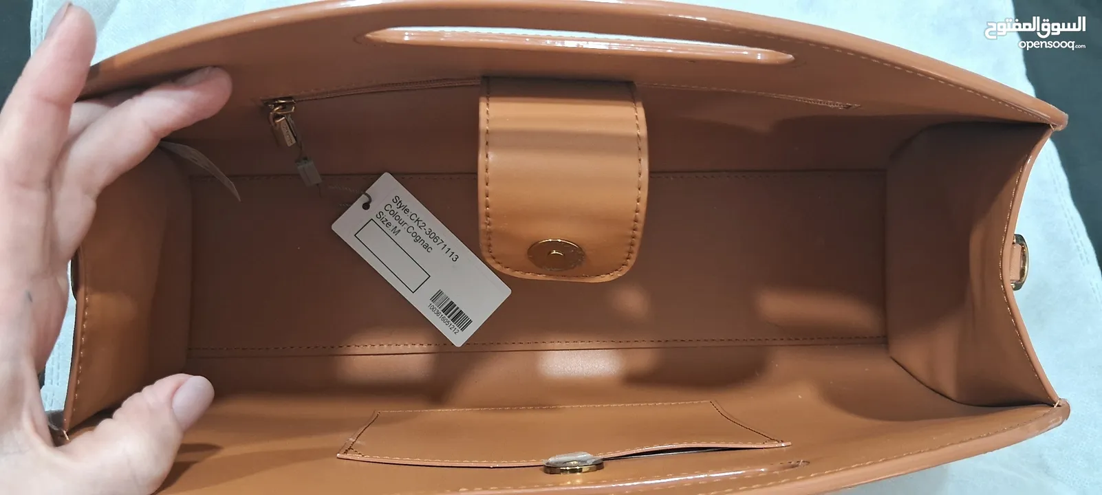 tags on new camel handbag unique with detachable strap