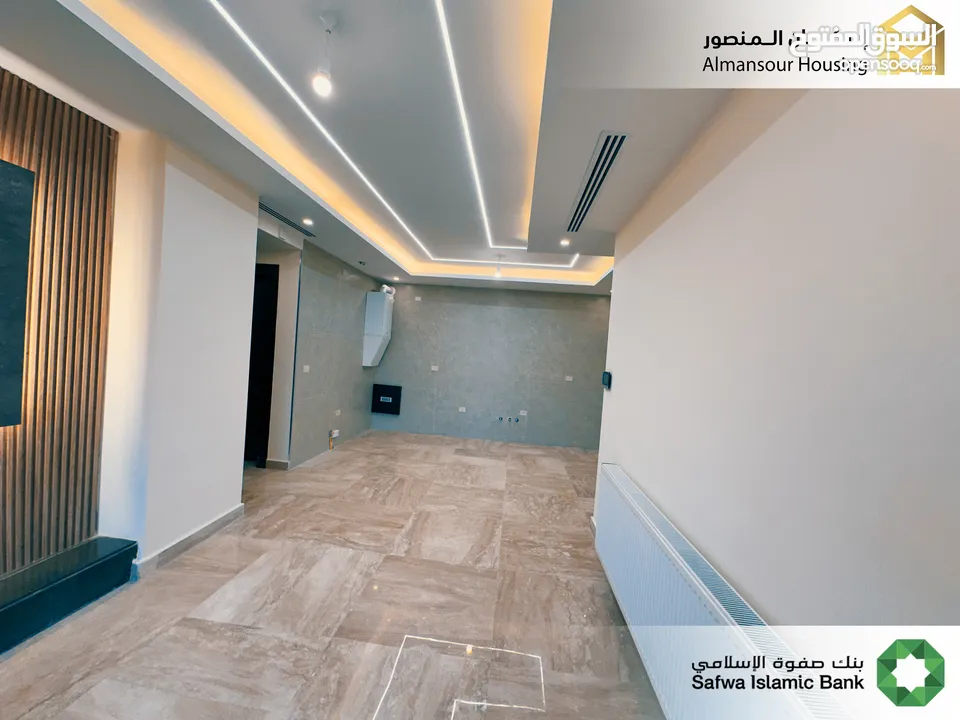 شقة طابق ثاني يمين 85م2 فاخرة للبيع في خلدا/ مشروع مكة مول 5 (2/2) ( إسكان المنصور )