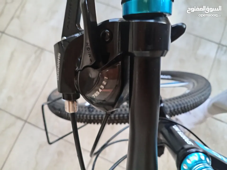 دراجة هوائية من نوع SPORTS INC من طراز SHIMANO جنط 26 باللون الأزرق اقرأ الوصف بدقة قابل للتفاوض