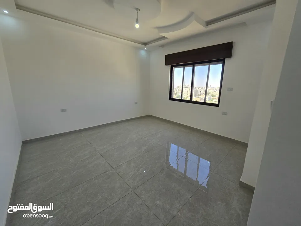 شقة يوبر ديلوكس طابق اخير مع روف مساحة 209 م ابو علندا إسكان الكهرباء