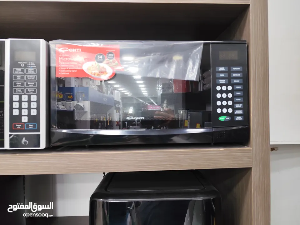 عرض نااار على ميكرويف كونتي 34 لتر  اسود 1400 واط